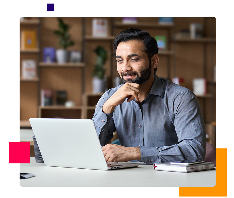 Man in an office using Core Cx360 on a laptop 