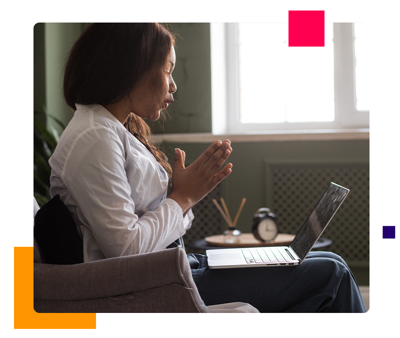 Female behavioral health practitioner using laptop