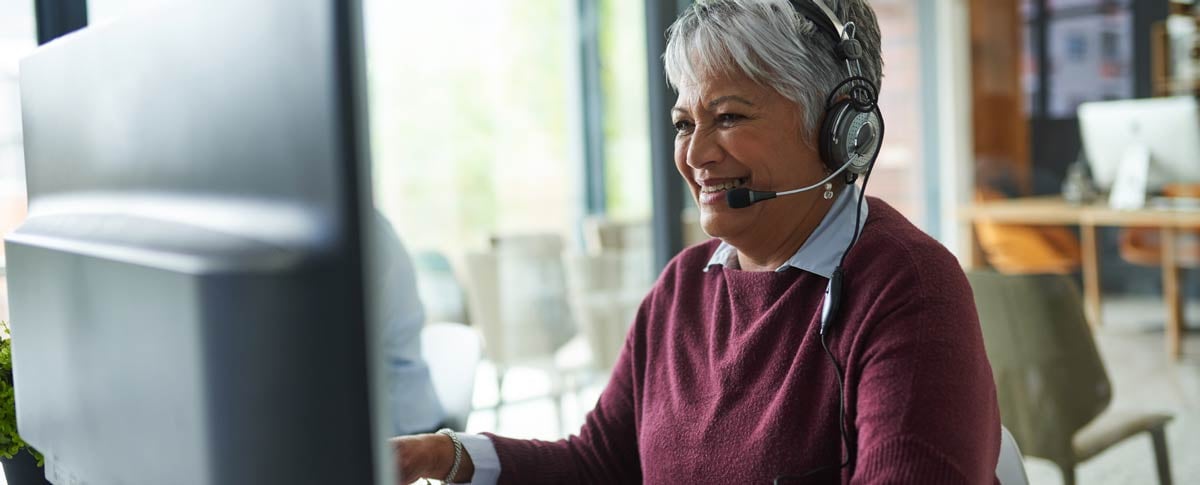 988 operator smiling