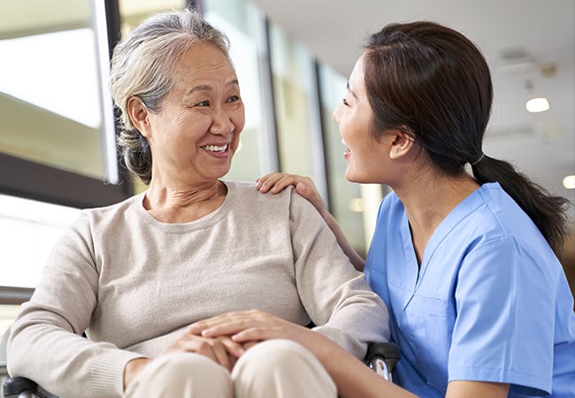 Nurse with elderly patient