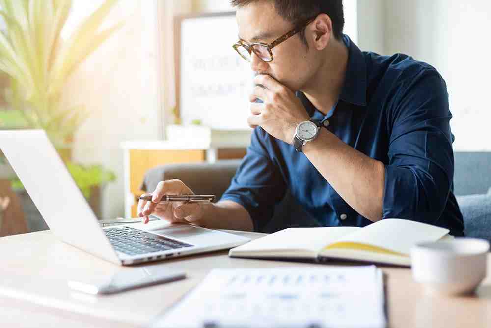 IDD provider reviewing billing and financial documents